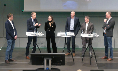 Podium der ISN-Mitgliederversammlung 2025 (v.l.): Andreas Beckhove (Moderation), Dr. Jörg Baumgarte, Dr. Carolin Winkel, Bernhard Oeller, Robert Römer, Marcus Arden (Moderation) ©ISN